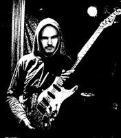 Billy-Corgan-in-hoodie-with-fender_black-and-white